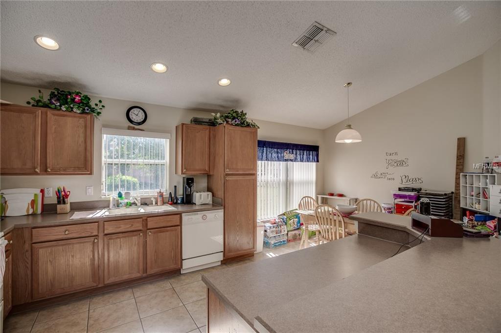 16103 BLOSSOM HILL LOOP, CLERMONT, Florida 34714, 5 Bedrooms Bedrooms, 10 Rooms Rooms,4 BathroomsBathrooms,Residential,For sale,BLOSSOM HILL,G4847078