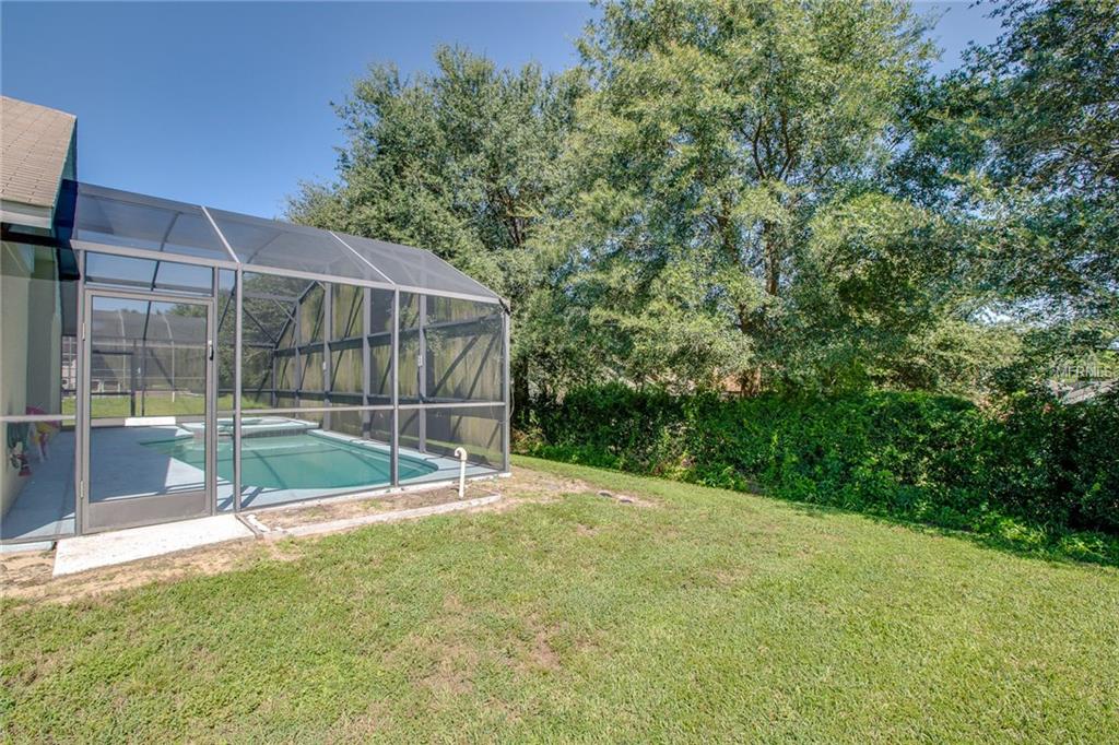 16103 BLOSSOM HILL LOOP, CLERMONT, Florida 34714, 5 Bedrooms Bedrooms, 10 Rooms Rooms,4 BathroomsBathrooms,Residential,For sale,BLOSSOM HILL,G4847078