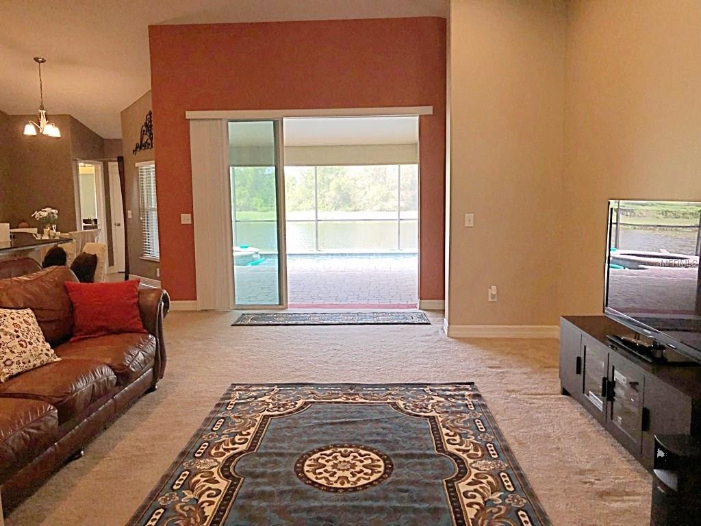 2443 KENCHESTER LOOP, WESLEY CHAPEL, Florida 33543, 5 Bedrooms Bedrooms, 12 Rooms Rooms,4 BathroomsBathrooms,Residential,For sale,KENCHESTER,T2923672