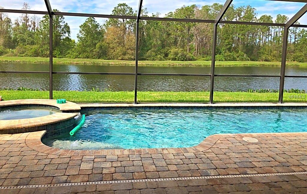 2443 KENCHESTER LOOP, WESLEY CHAPEL, Florida 33543, 5 Bedrooms Bedrooms, 12 Rooms Rooms,4 BathroomsBathrooms,Residential,For sale,KENCHESTER,T2923672