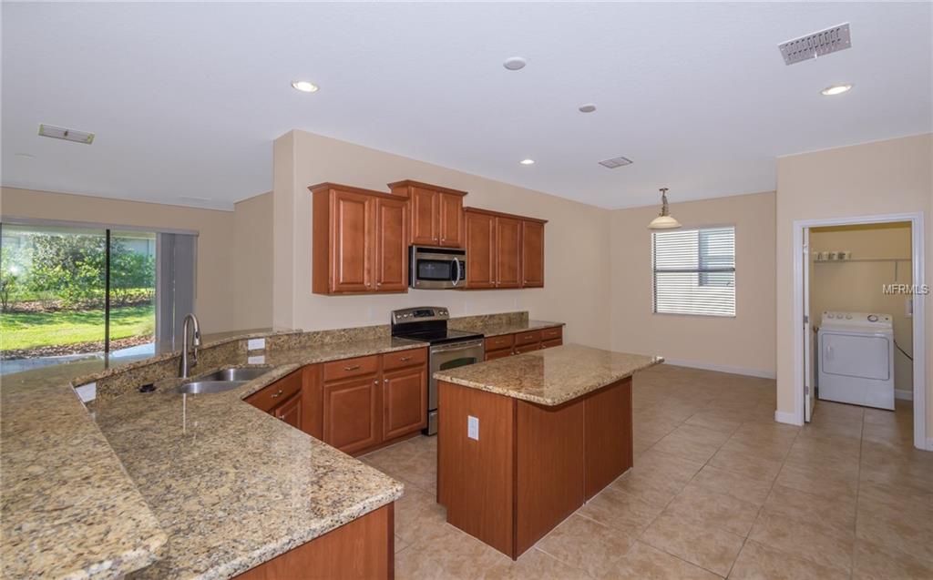 1368 PALMETTO DUNES STREET, DAVENPORT, Florida 33897, 4 Bedrooms Bedrooms, 9 Rooms Rooms,3 BathroomsBathrooms,Residential,For sale,PALMETTO DUNES,O5544519