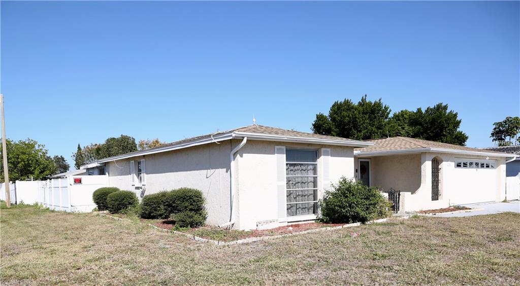 7205 WESTCOTT DRIVE, PORT RICHEY, Florida 34668, 3 Bedrooms Bedrooms, 5 Rooms Rooms,2 BathroomsBathrooms,Residential,For sale,WESTCOTT,W7634929