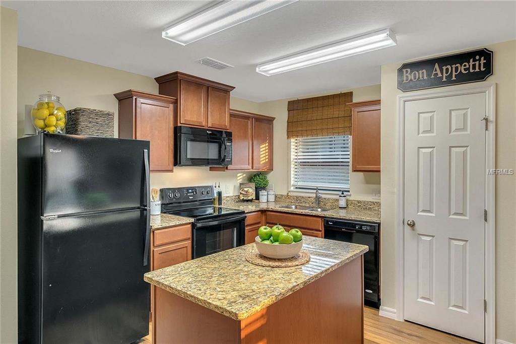 1300 WOODLARK DRIVE, HAINES CITY, Florida 33844, 3 Bedrooms Bedrooms, 6 Rooms Rooms,2 BathroomsBathrooms,Residential,For sale,WOODLARK,O5557892