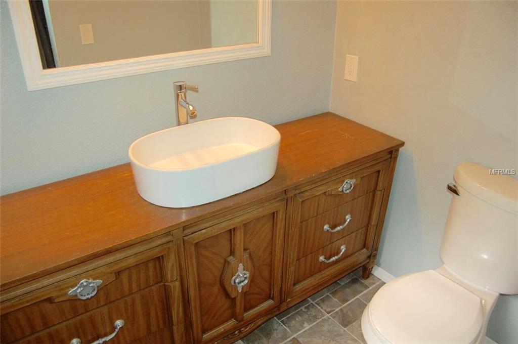 330 BLUEBIRD AVENUE, LAKELAND, Florida 33809, 3 Bedrooms Bedrooms, 5 Rooms Rooms,2 BathroomsBathrooms,Residential,For sale,BLUEBIRD,A4204237