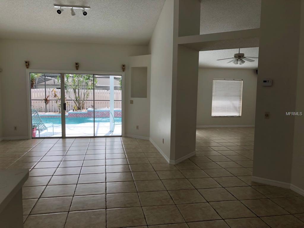 2808 EAGLE LAKE DRIVE, ORLANDO, Florida 32837, 4 Bedrooms Bedrooms, 7 Rooms Rooms,2 BathroomsBathrooms,Residential,For sale,EAGLE LAKE,O5540744