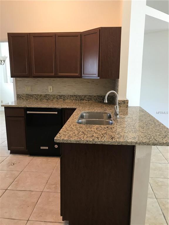 2808 EAGLE LAKE DRIVE, ORLANDO, Florida 32837, 4 Bedrooms Bedrooms, 7 Rooms Rooms,2 BathroomsBathrooms,Residential,For sale,EAGLE LAKE,O5540744