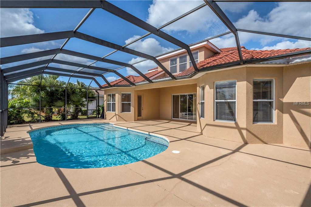 5241 GRAND PALMETTO WAY, NORTH PORT, Florida 34291, 4 Bedrooms Bedrooms, 10 Rooms Rooms,3 BathroomsBathrooms,Residential,For sale,GRAND PALMETTO,C7247996