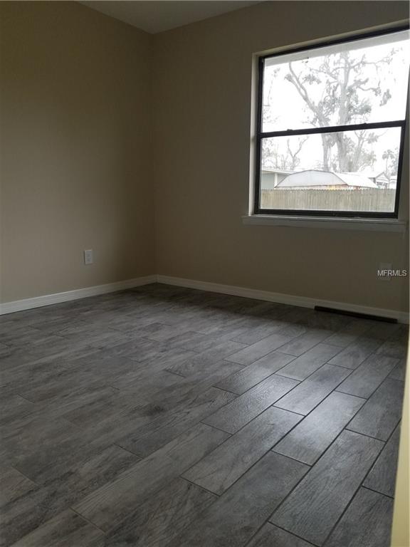 704 GROVE AVENUE, HOLLY HILL, Florida 32117, 3 Bedrooms Bedrooms, 5 Rooms Rooms,2 BathroomsBathrooms,Residential,For sale,GROVE,S4856968