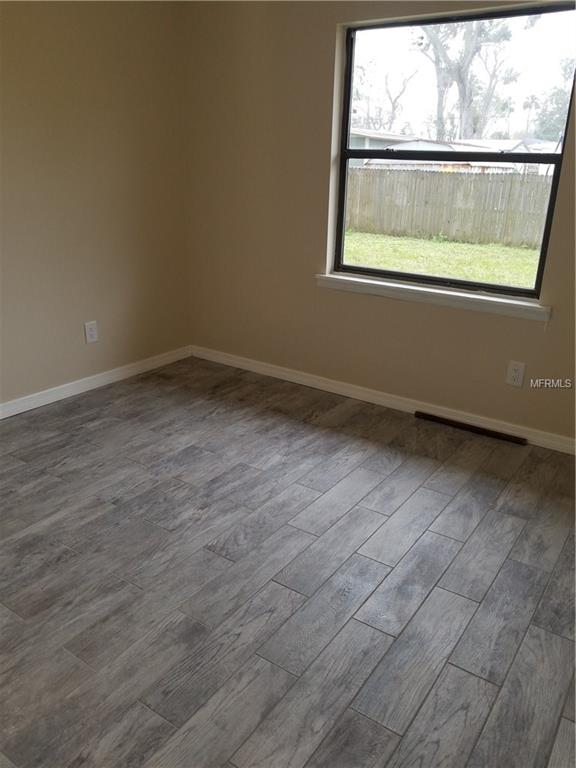 704 GROVE AVENUE, HOLLY HILL, Florida 32117, 3 Bedrooms Bedrooms, 5 Rooms Rooms,2 BathroomsBathrooms,Residential,For sale,GROVE,S4856968