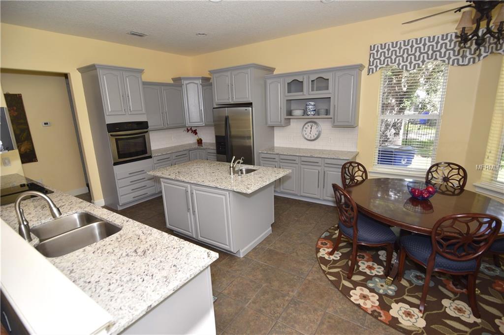 1405 HIDDEN OAKS BEND, SAINT CLOUD, Florida 34771, 6 Bedrooms Bedrooms, 8 Rooms Rooms,4 BathroomsBathrooms,Residential,For sale,HIDDEN OAKS,O5528313