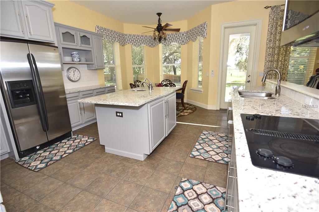 1405 HIDDEN OAKS BEND, SAINT CLOUD, Florida 34771, 6 Bedrooms Bedrooms, 8 Rooms Rooms,4 BathroomsBathrooms,Residential,For sale,HIDDEN OAKS,O5528313