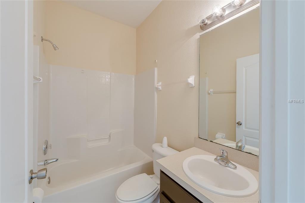 4951 WATERSIDE POINTE CIRCLE, ORLANDO, Florida 32829, 4 Bedrooms Bedrooms, 7 Rooms Rooms,2 BathroomsBathrooms,Residential,For sale,WATERSIDE POINTE,O5561378