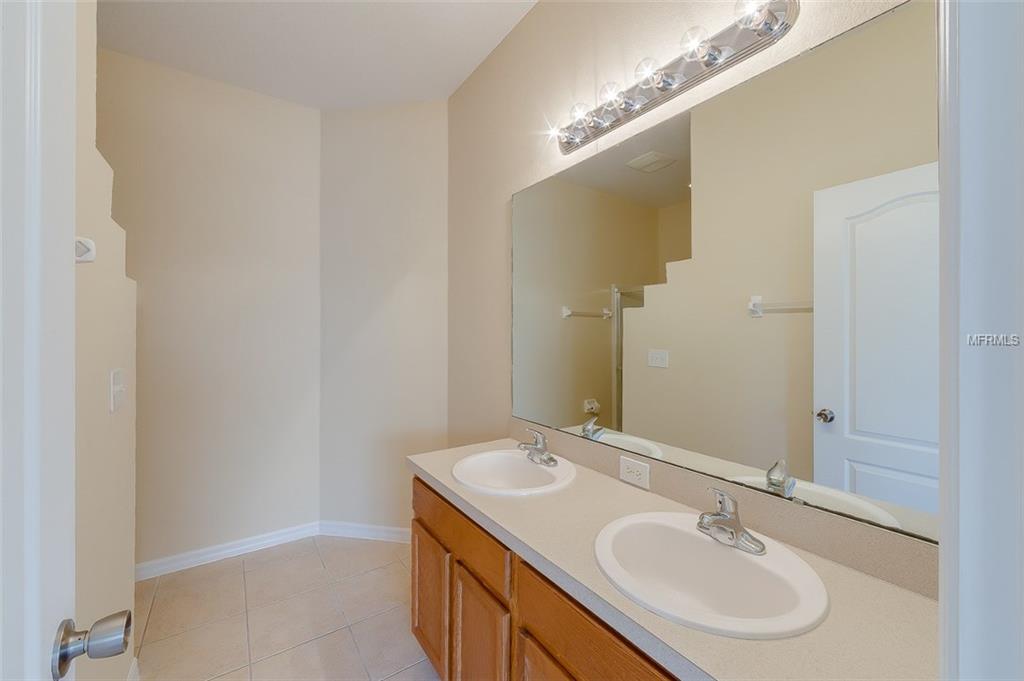 4951 WATERSIDE POINTE CIRCLE, ORLANDO, Florida 32829, 4 Bedrooms Bedrooms, 7 Rooms Rooms,2 BathroomsBathrooms,Residential,For sale,WATERSIDE POINTE,O5561378