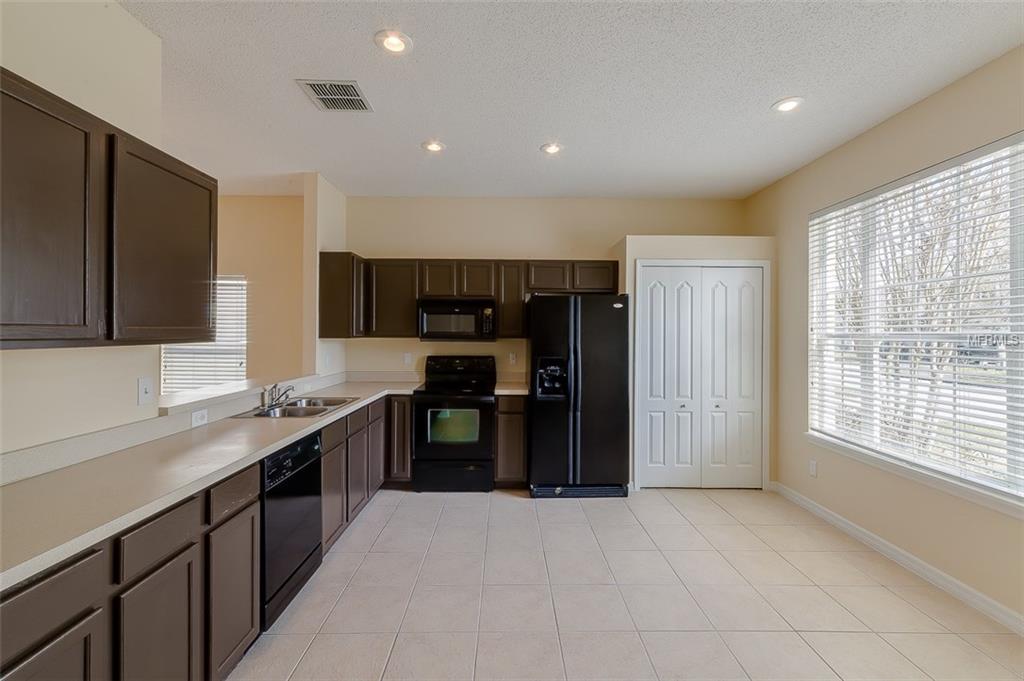 4951 WATERSIDE POINTE CIRCLE, ORLANDO, Florida 32829, 4 Bedrooms Bedrooms, 7 Rooms Rooms,2 BathroomsBathrooms,Residential,For sale,WATERSIDE POINTE,O5561378