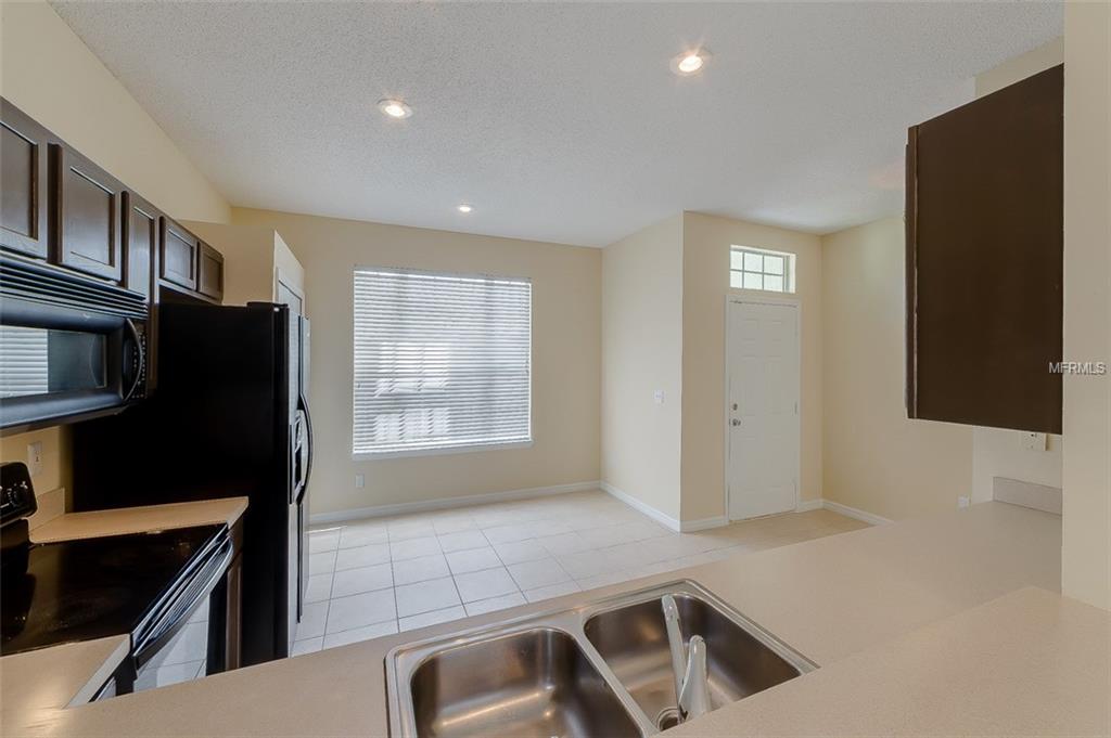 4951 WATERSIDE POINTE CIRCLE, ORLANDO, Florida 32829, 4 Bedrooms Bedrooms, 7 Rooms Rooms,2 BathroomsBathrooms,Residential,For sale,WATERSIDE POINTE,O5561378