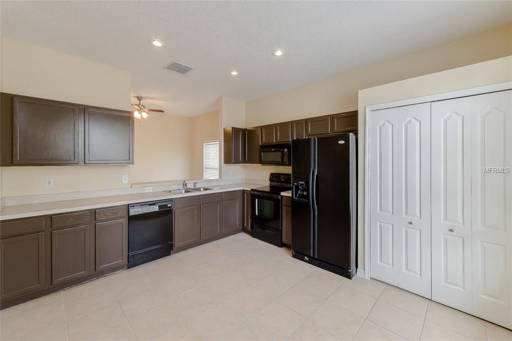 4951 WATERSIDE POINTE CIRCLE, ORLANDO, Florida 32829, 4 Bedrooms Bedrooms, 7 Rooms Rooms,2 BathroomsBathrooms,Residential,For sale,WATERSIDE POINTE,O5561378