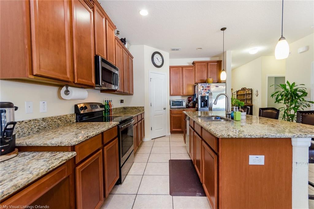 1911 RAFTON ROAD, APOPKA, Florida 32703, 5 Bedrooms Bedrooms, 8 Rooms Rooms,3 BathroomsBathrooms,Residential,For sale,RAFTON,O5528357