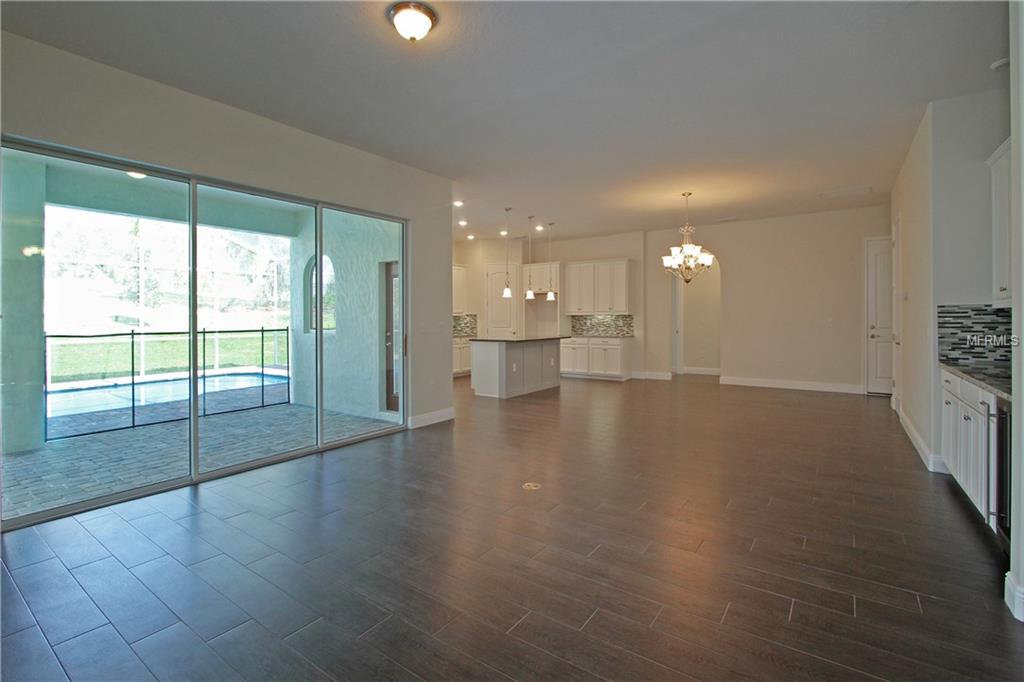 619 SANCTUARY GOLF PLACE, APOPKA, Florida 32712, 5 Bedrooms Bedrooms, 10 Rooms Rooms,4 BathroomsBathrooms,Residential,For sale,SANCTUARY GOLF,O5540760