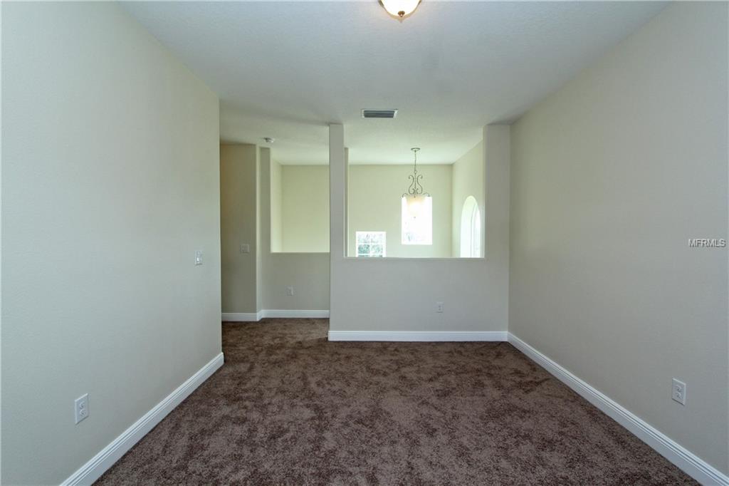 619 SANCTUARY GOLF PLACE, APOPKA, Florida 32712, 5 Bedrooms Bedrooms, 10 Rooms Rooms,4 BathroomsBathrooms,Residential,For sale,SANCTUARY GOLF,O5540760