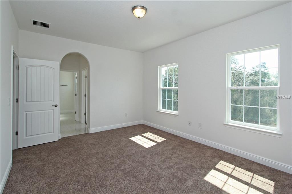 619 SANCTUARY GOLF PLACE, APOPKA, Florida 32712, 5 Bedrooms Bedrooms, 10 Rooms Rooms,4 BathroomsBathrooms,Residential,For sale,SANCTUARY GOLF,O5540760