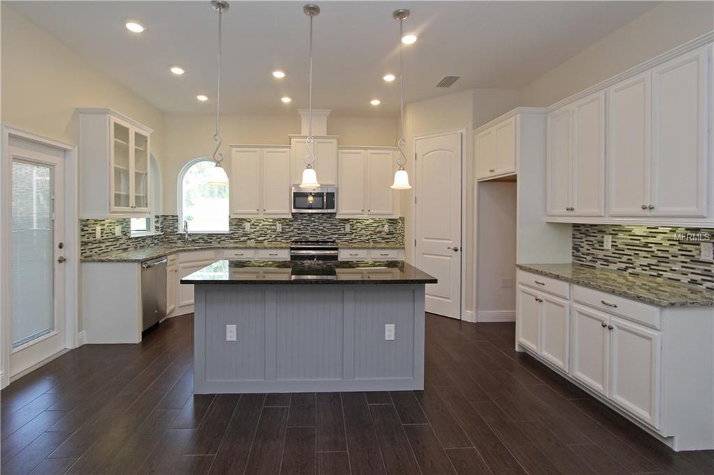 619 SANCTUARY GOLF PLACE, APOPKA, Florida 32712, 5 Bedrooms Bedrooms, 10 Rooms Rooms,4 BathroomsBathrooms,Residential,For sale,SANCTUARY GOLF,O5540760