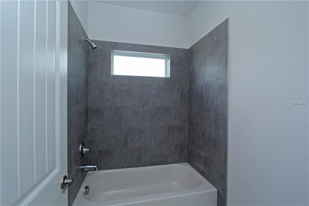 619 SANCTUARY GOLF PLACE, APOPKA, Florida 32712, 5 Bedrooms Bedrooms, 10 Rooms Rooms,4 BathroomsBathrooms,Residential,For sale,SANCTUARY GOLF,O5540760