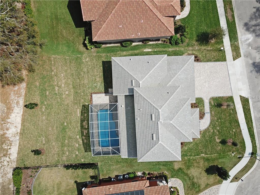 619 SANCTUARY GOLF PLACE, APOPKA, Florida 32712, 5 Bedrooms Bedrooms, 10 Rooms Rooms,4 BathroomsBathrooms,Residential,For sale,SANCTUARY GOLF,O5540760