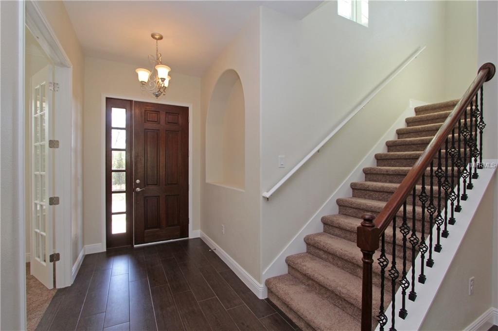 619 SANCTUARY GOLF PLACE, APOPKA, Florida 32712, 5 Bedrooms Bedrooms, 10 Rooms Rooms,4 BathroomsBathrooms,Residential,For sale,SANCTUARY GOLF,O5540760