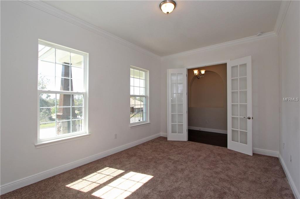 619 SANCTUARY GOLF PLACE, APOPKA, Florida 32712, 5 Bedrooms Bedrooms, 10 Rooms Rooms,4 BathroomsBathrooms,Residential,For sale,SANCTUARY GOLF,O5540760