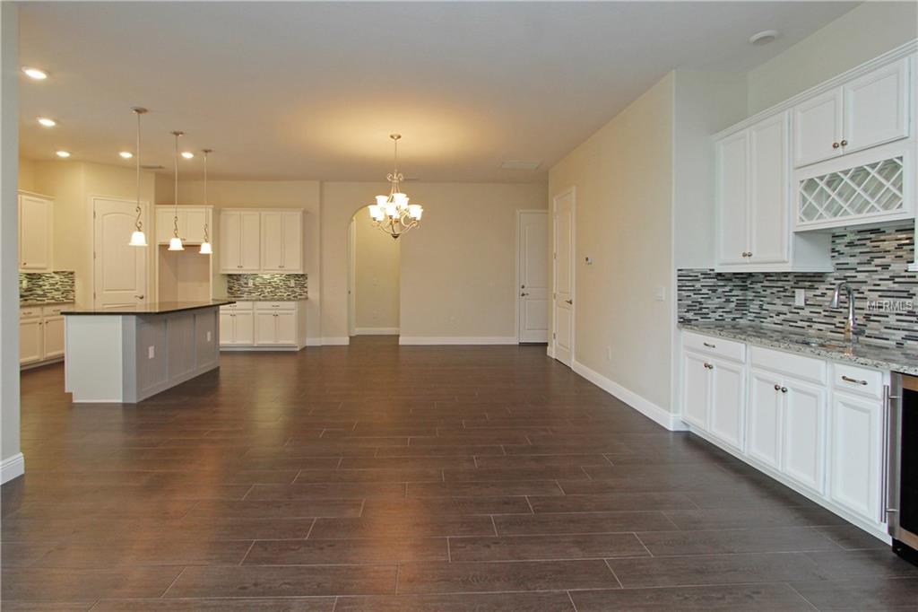 619 SANCTUARY GOLF PLACE, APOPKA, Florida 32712, 5 Bedrooms Bedrooms, 10 Rooms Rooms,4 BathroomsBathrooms,Residential,For sale,SANCTUARY GOLF,O5540760