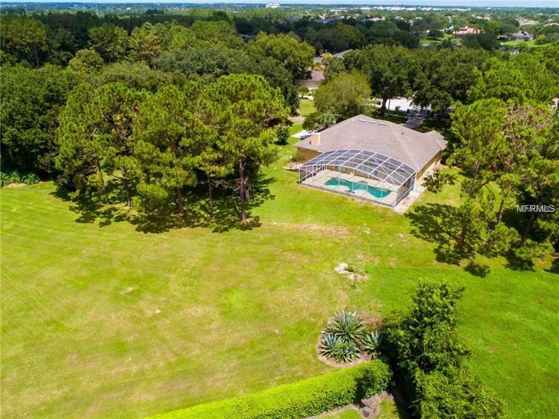 2834 TROPIC COURT, WINTER GARDEN, Florida 34787, 4 Bedrooms Bedrooms, 12 Rooms Rooms,3 BathroomsBathrooms,Residential,For sale,TROPIC,O5547335