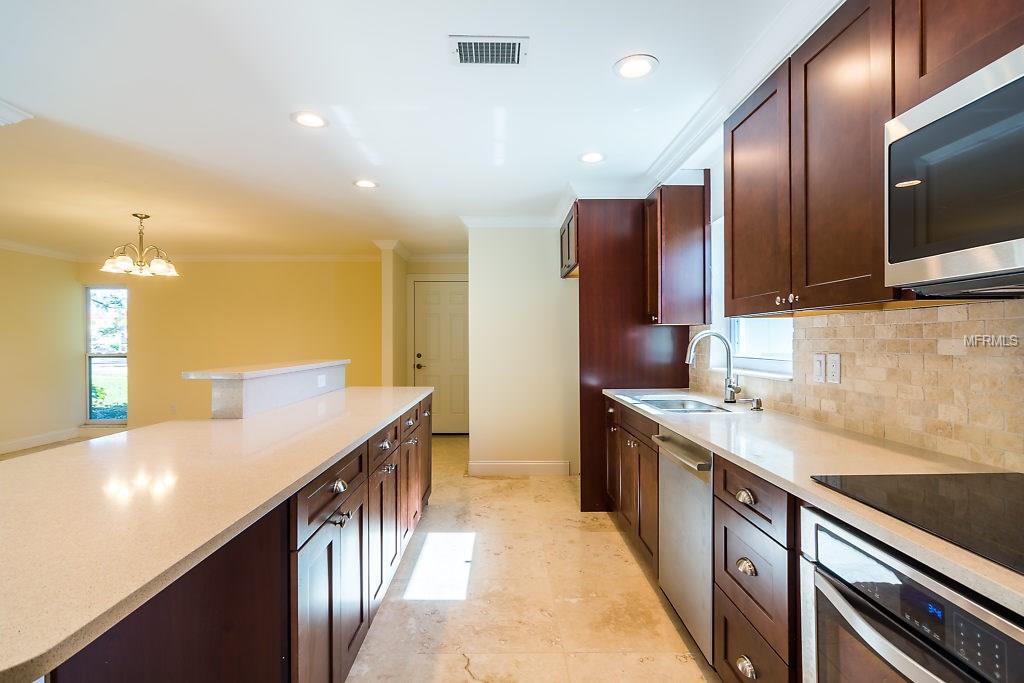 1559 EDEN ISLE BOULEVARD NE, ST PETERSBURG, Florida 33704, 4 Bedrooms Bedrooms, 7 Rooms Rooms,3 BathroomsBathrooms,Residential,For sale,EDEN ISLE,T2911664