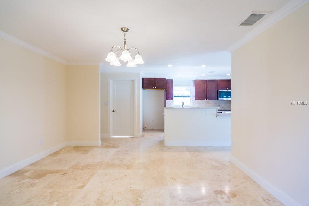 1559 EDEN ISLE BOULEVARD NE, ST PETERSBURG, Florida 33704, 4 Bedrooms Bedrooms, 7 Rooms Rooms,3 BathroomsBathrooms,Residential,For sale,EDEN ISLE,T2911664