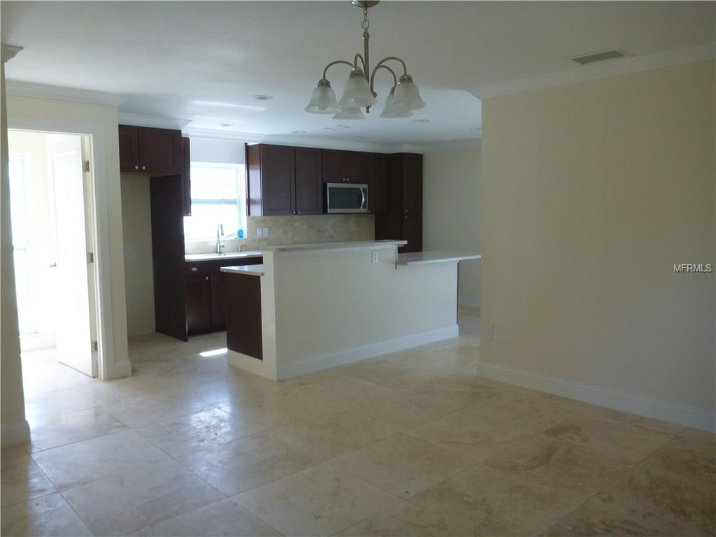 1559 EDEN ISLE BOULEVARD NE, ST PETERSBURG, Florida 33704, 4 Bedrooms Bedrooms, 7 Rooms Rooms,3 BathroomsBathrooms,Residential,For sale,EDEN ISLE,T2911664