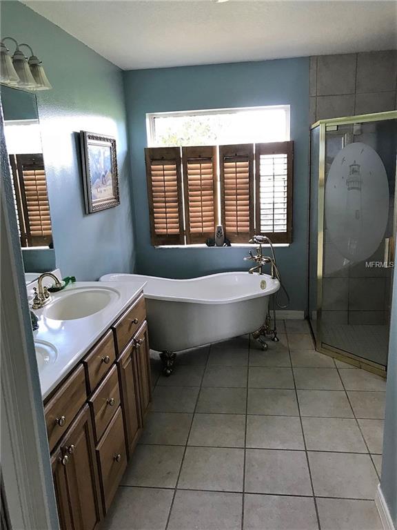 13625 FLORIDA AVENUE, ASTATULA, Florida 34705, 4 Bedrooms Bedrooms, 8 Rooms Rooms,3 BathroomsBathrooms,Residential,For sale,FLORIDA,G4847142