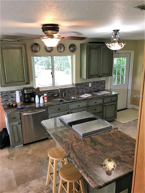 13625 FLORIDA AVENUE, ASTATULA, Florida 34705, 4 Bedrooms Bedrooms, 8 Rooms Rooms,3 BathroomsBathrooms,Residential,For sale,FLORIDA,G4847142