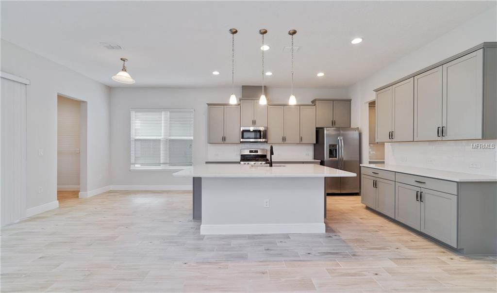 7159 SUMMERLAKE GROVES STREET, WINTER GARDEN, Florida 34787, 4 Bedrooms Bedrooms, 8 Rooms Rooms,2 BathroomsBathrooms,Residential,For sale,SUMMERLAKE GROVES,O5511077