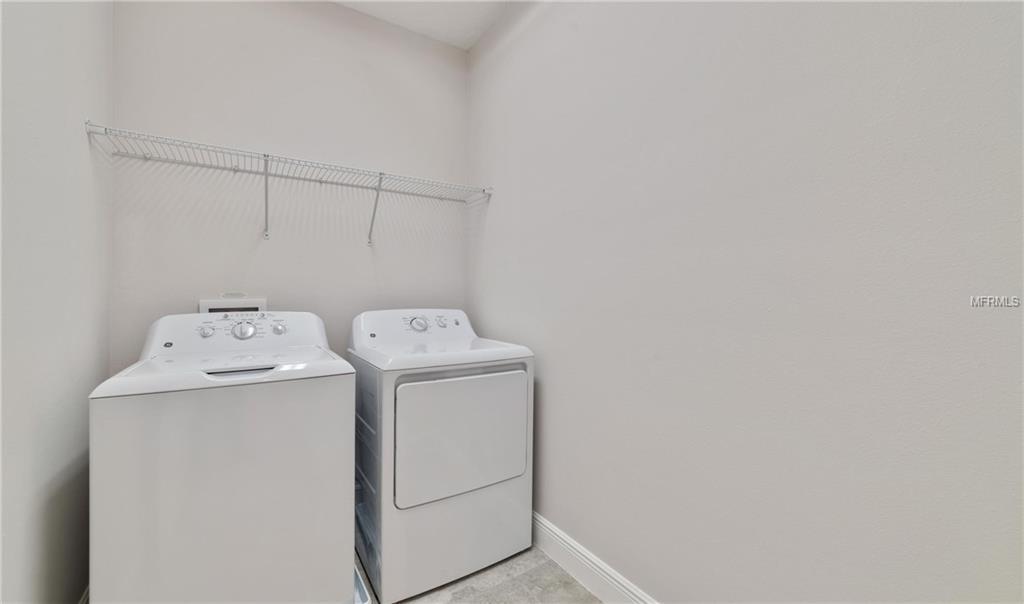 7159 SUMMERLAKE GROVES STREET, WINTER GARDEN, Florida 34787, 4 Bedrooms Bedrooms, 8 Rooms Rooms,2 BathroomsBathrooms,Residential,For sale,SUMMERLAKE GROVES,O5511077