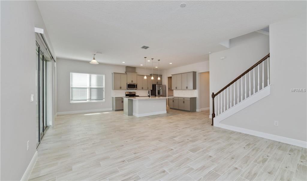 7159 SUMMERLAKE GROVES STREET, WINTER GARDEN, Florida 34787, 4 Bedrooms Bedrooms, 8 Rooms Rooms,2 BathroomsBathrooms,Residential,For sale,SUMMERLAKE GROVES,O5511077