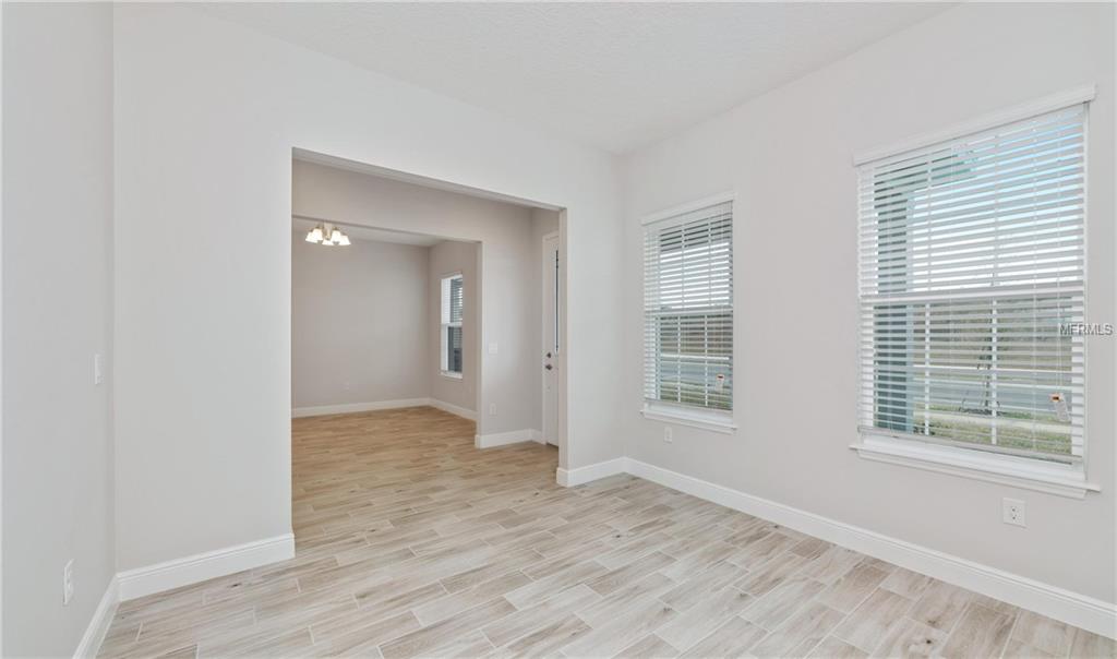 7159 SUMMERLAKE GROVES STREET, WINTER GARDEN, Florida 34787, 4 Bedrooms Bedrooms, 8 Rooms Rooms,2 BathroomsBathrooms,Residential,For sale,SUMMERLAKE GROVES,O5511077