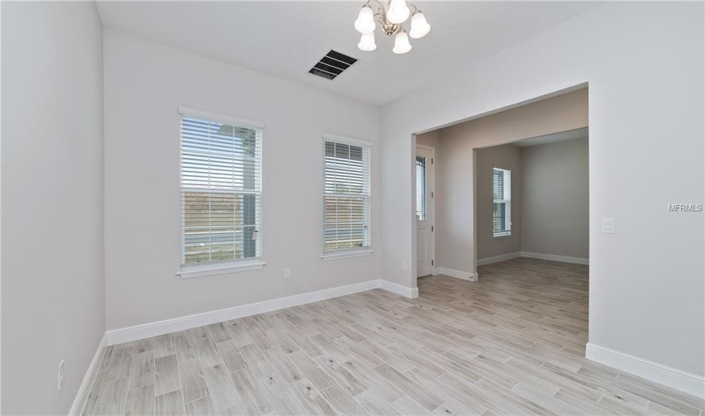 7159 SUMMERLAKE GROVES STREET, WINTER GARDEN, Florida 34787, 4 Bedrooms Bedrooms, 8 Rooms Rooms,2 BathroomsBathrooms,Residential,For sale,SUMMERLAKE GROVES,O5511077