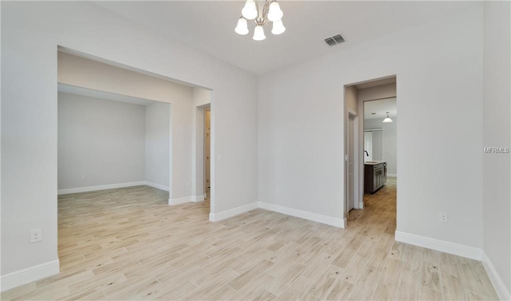 7159 SUMMERLAKE GROVES STREET, WINTER GARDEN, Florida 34787, 4 Bedrooms Bedrooms, 8 Rooms Rooms,2 BathroomsBathrooms,Residential,For sale,SUMMERLAKE GROVES,O5511077