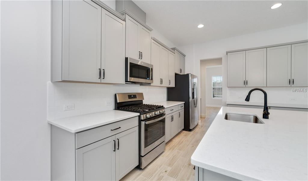 7159 SUMMERLAKE GROVES STREET, WINTER GARDEN, Florida 34787, 4 Bedrooms Bedrooms, 8 Rooms Rooms,2 BathroomsBathrooms,Residential,For sale,SUMMERLAKE GROVES,O5511077