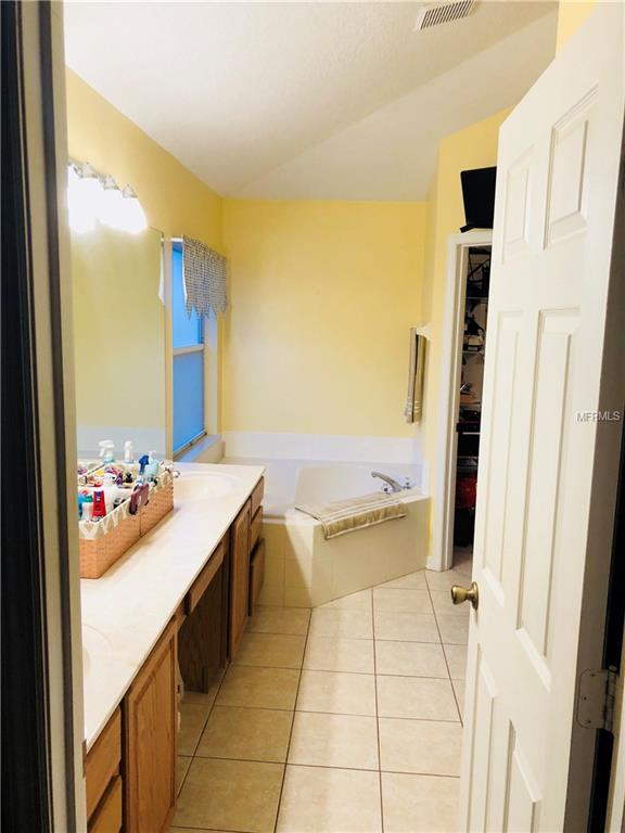 3232 HERONS POINT CIRCLE, KISSIMMEE, Florida 34741, 4 Bedrooms Bedrooms, 9 Rooms Rooms,2 BathroomsBathrooms,Residential,For sale,HERONS POINT,O5557922