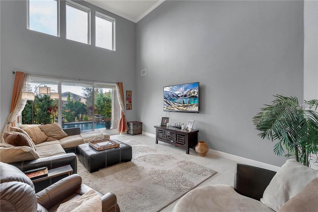 15455 SANDFIELD LOOP, WINTER GARDEN, Florida 34787, 4 Bedrooms Bedrooms, 11 Rooms Rooms,3 BathroomsBathrooms,Residential,For sale,SANDFIELD,O5561586