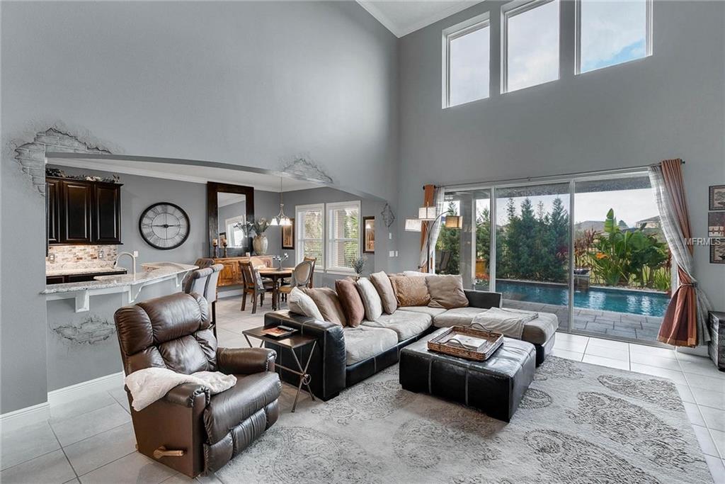 15455 SANDFIELD LOOP, WINTER GARDEN, Florida 34787, 4 Bedrooms Bedrooms, 11 Rooms Rooms,3 BathroomsBathrooms,Residential,For sale,SANDFIELD,O5561586