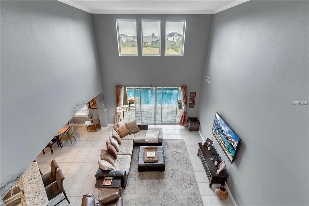 15455 SANDFIELD LOOP, WINTER GARDEN, Florida 34787, 4 Bedrooms Bedrooms, 11 Rooms Rooms,3 BathroomsBathrooms,Residential,For sale,SANDFIELD,O5561586