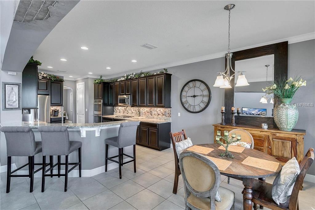 15455 SANDFIELD LOOP, WINTER GARDEN, Florida 34787, 4 Bedrooms Bedrooms, 11 Rooms Rooms,3 BathroomsBathrooms,Residential,For sale,SANDFIELD,O5561586