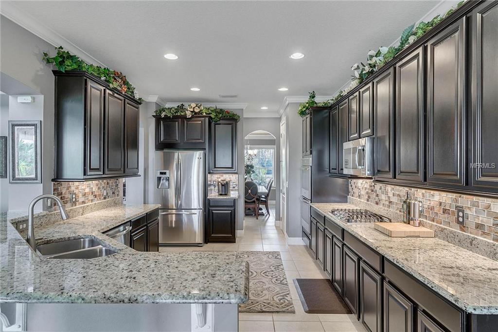 15455 SANDFIELD LOOP, WINTER GARDEN, Florida 34787, 4 Bedrooms Bedrooms, 11 Rooms Rooms,3 BathroomsBathrooms,Residential,For sale,SANDFIELD,O5561586