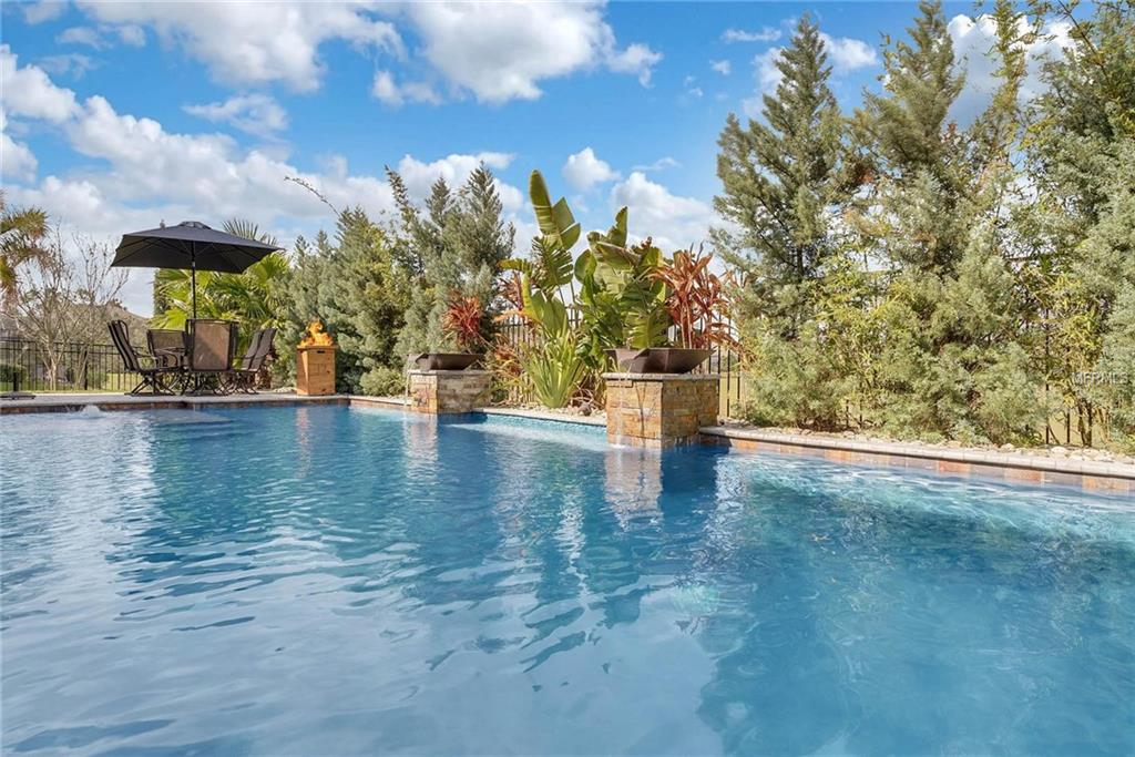 15455 SANDFIELD LOOP, WINTER GARDEN, Florida 34787, 4 Bedrooms Bedrooms, 11 Rooms Rooms,3 BathroomsBathrooms,Residential,For sale,SANDFIELD,O5561586